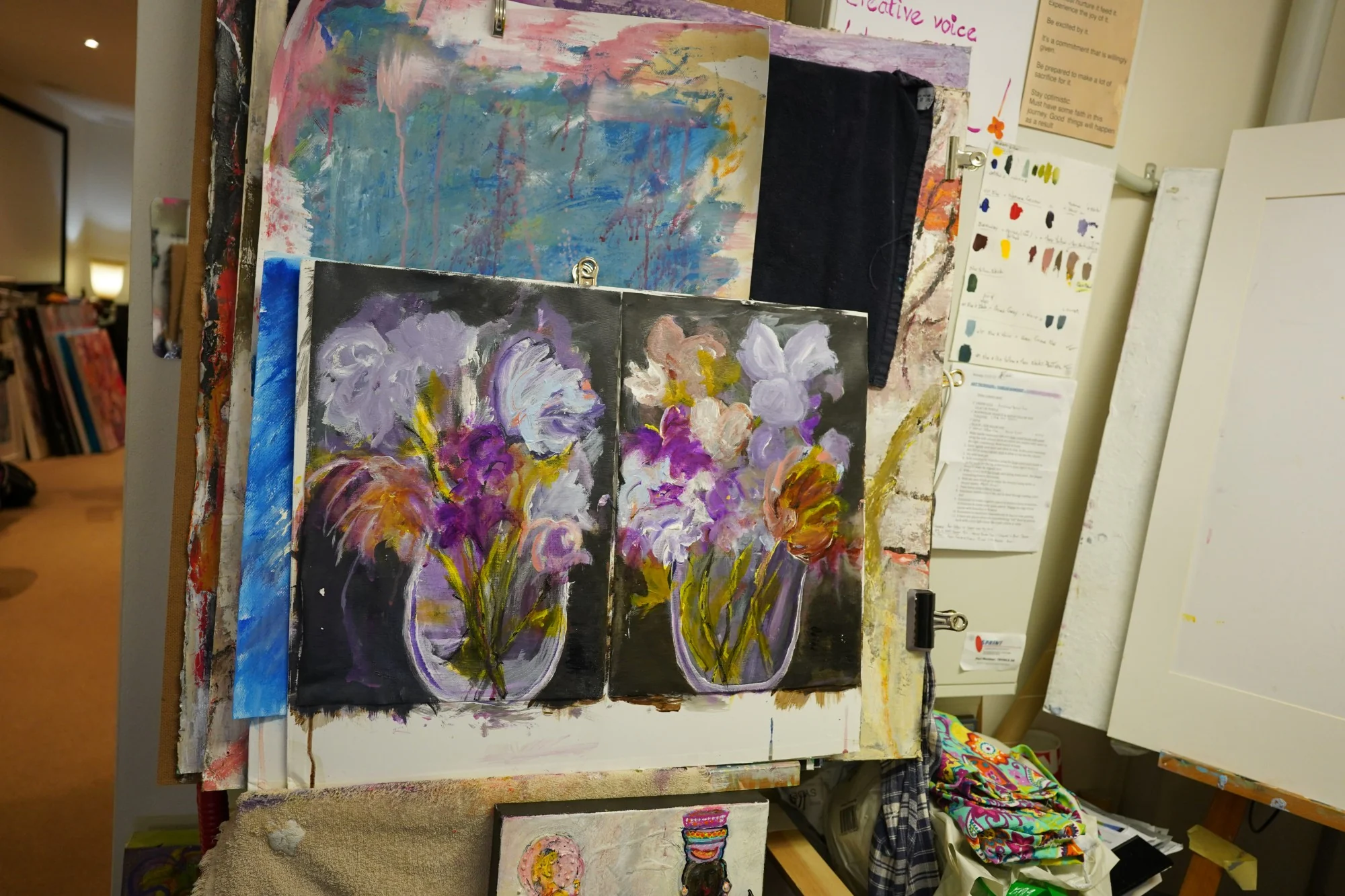 A floral diptych part-painted on the easel in Renée Kanowitz’s Sydney studio